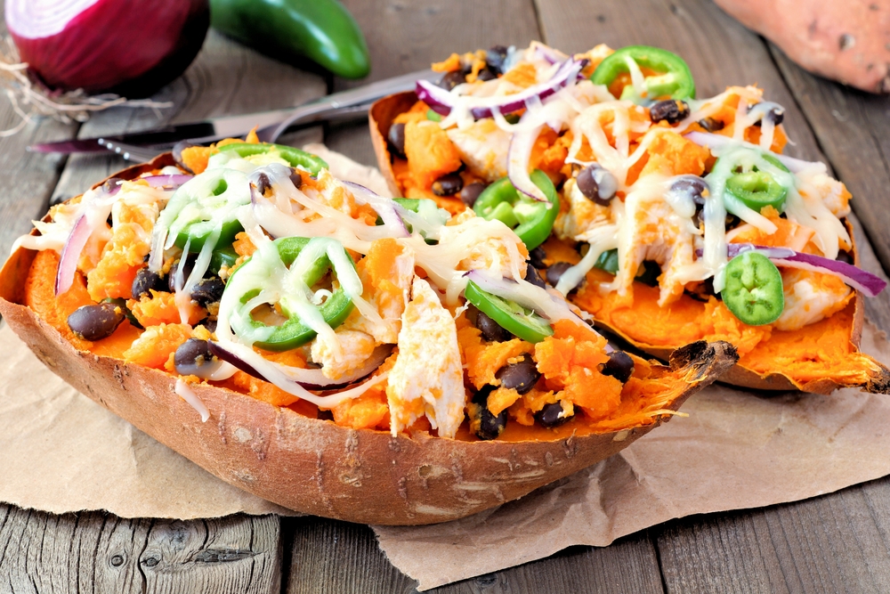 Baked sweet potato with black beans salsa